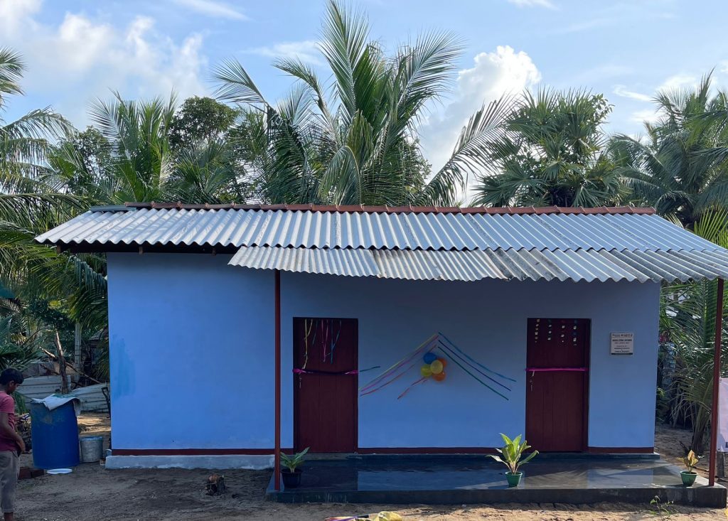 A newly completed family shelter built by Al-Hikma Charitable Foundation, decorated for handover day